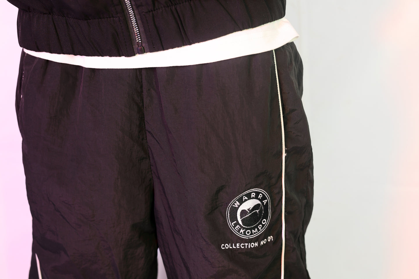 WARRA x LEKOMPO Track Pants